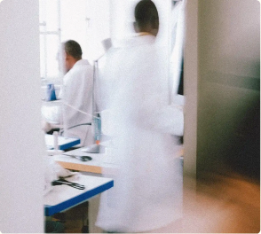 A clinician preparing treatment