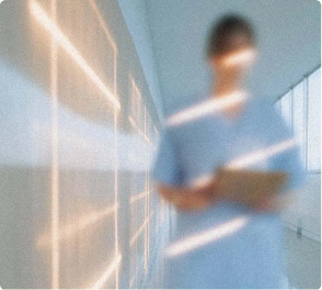 A patient walking down a corridor